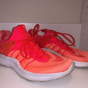 Bright orange Nike sneakers!